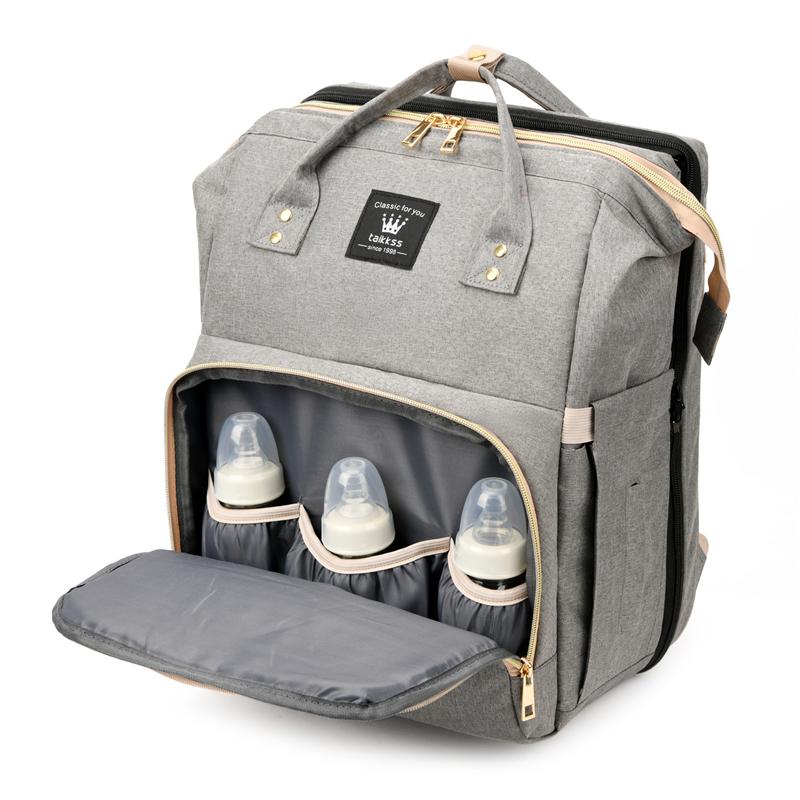best diaper bag with changing station